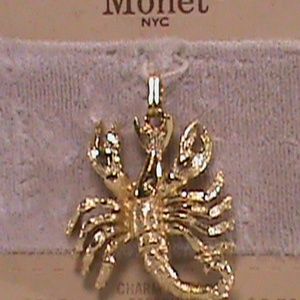 MONET Gold Toned Scorpio Charm